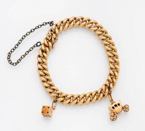 A curblink bracelet with charms. 18ct and 9ct yellow gold. Weight 20.84 grams.