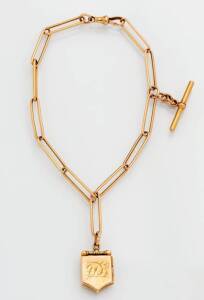 &nbsp;A curblink watch chain and locket. 15ct gold. Weight &nbsp;33 grams.