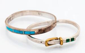 Two Mexican silver bangles. One set with malachite, the other with turquoise.
