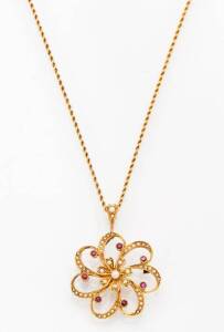 &nbsp;An Edwardian ruby and seed pearl pendant. Yellow gold.