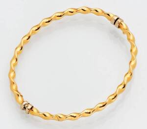 &nbsp;A rope twist bangle. 18k yellow gold. Weight 3.60 grams.
