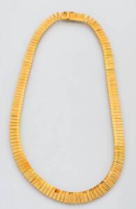 An articulated collar. 18ct yellow gold. Length 45cm. 39.75 grams.