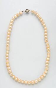 Three freshwater pearl necklaces and two pairs of earrings.