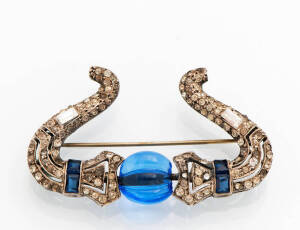 A French Art Deco blue and white paste brooch. Silver.
