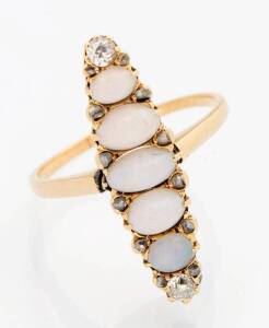 A Victorian opal and diamond ring. The marquise shaped ring set with five solid white opal cabochons and ten rose cut diamonds. 18ct yellow gold. Size O.&nbsp;