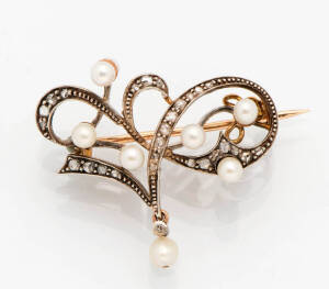 An antique European pearl and diamond scroll brooch. Rose gold and silver. Length 3cm. Weight 6.26 grams.&nbsp;