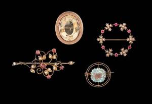 A group of four gold brooches. 9ct yellow and rose gold.&nbsp;