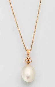 A mabe pearl and diamond pendant on chain. 18ct yellow gold.&nbsp;