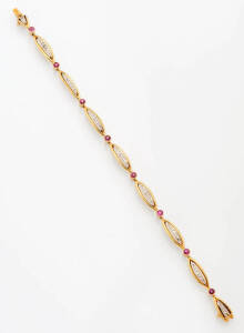 A French Retro ruby and diamond bracelet. Total weight of rubies 1.2 carats. 18ct yellow gold &nbsp;Length 20cm.&nbsp;