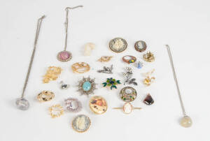 An assorted box of costume jewellery including necklaces and brooches.