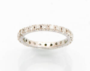 A diamond eternity band. 18ct white gold.