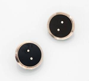 A pair of onyx and diamond Art Deco earrings. White gold.