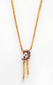 An Italian diamond and ruby collar. 14ct yellow gold. Weight 22.10 grams.