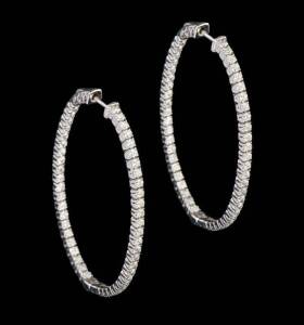 A pair of diamond hoop earrings. Total diamond weight 3.25 carats. 14ct white gold. Length 4.8cms.