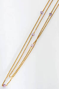 An amethyst muff chain. Yellow gold. Weight 13.5 grams. Length