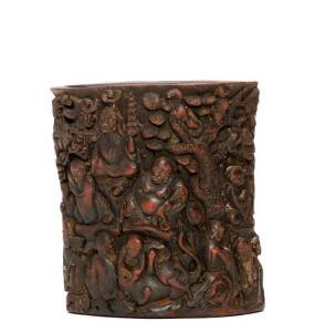 A Chinese pottery brushpot decorated with immortals and monkeys, 13.9cm high