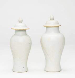 A pair of Chinese Fujian white glazed covered jars from a shipwreck, 18th century, 15.5 and 16cm high