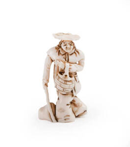 NETSUKE: Two figurative carved ivories in European costume. Approximately 5cm each.&nbsp;