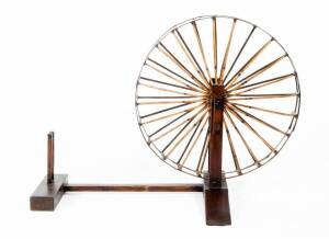 Chinese spinning wheel, timber and bamboo, 20th century. Height 68cm, length 100cm
