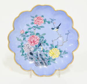 Canton enamel dish showing birds & peonies on blue ground, early 20th century. Diameter 16cm.