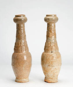 TOMB JARS: A pair of Song earthen ware funeral jars. Height 33cm each