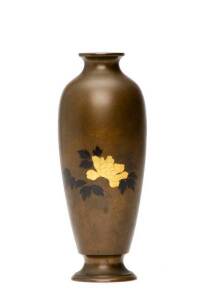 A Japanese mixed metal bronze vase, Meiji Period, inlaid in gold copper and shakudo, 14cm high together with a Shibayama inlaid ivory box, 6.5cm diameter. (2 items)