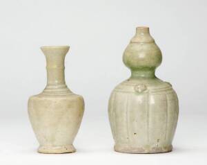 Two unusual South East Asian pale celadon glaze vases, probably 15th/16th century, 12 and 14cm high