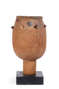 An African tribal drum, late 19th century of cylindrical form with inscription &ldquo;Third Battalion, W. I. Regiment captured at Djachi, Ashanti, 24th August 1900, presented by Captain H.A Thorne". 103cm high
