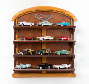 FRANKLIN MINT "THE CLASSIC CARS OF THE FIFTIES ('50s)" COMPLETE SET includes 12 die-cast 1:43 scale cars and a 4-shelf display unit.