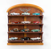 FRANKLIN MINT "THE CLASSIC CARS OF THE FIFTIES ('50s)" COMPLETE SET includes 12 die-cast 1:43 scale cars and a 4-shelf display unit.