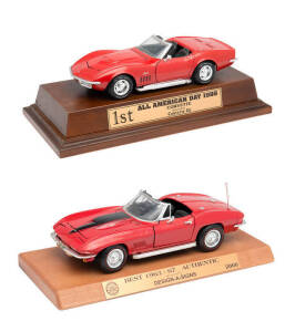 Award displays incorporating 1:18 scale models: "1st All American Day 1998 Corvette" (red Stingray); "Best 1963-67 Authentic 2000" (red Stingray); "Best 1991-96 Authentic 2000" (pale blue); "Best 1953-62 Authentic 2000" (pale blue with white inserts). (4 