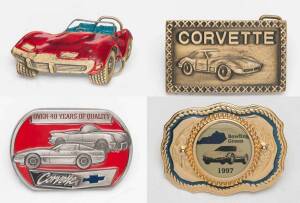 A collection of seven Corvette belt buckles, novelty bachelor cutlery set in the form of tools and 3 other items