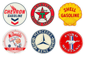 A Shell Gasoline shaped enamel sign 30cm high, with a McDonald’s circular enamelled signed 30cm diameter, and four other circular pressed tin signs  