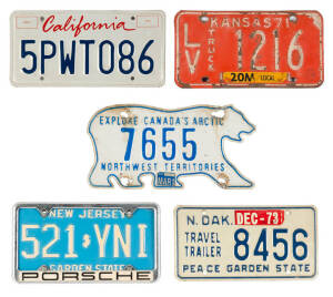 A collection of vehicle number plates mainly from North America and Canada (approximately 17)