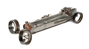 An impressive metal sculpture of a racing car cornering at speed by James Corbett, 97cm long.&nbsp; Inscribed to the bonnet &lsquo;Peoples Choice NBCSS 2007&rsquo;.&nbsp; Awarded to the vendor by the Noosa Beach Classic Car Club for the People&rsquo;s Choice Award for his 1960 Corve