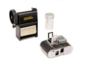 CONCAVA S.A. (Switzerland): Tessina 35mm miniature twin lens reflex camera SN 65220. This is the black version with front and back in chrome. With the difficult to find lightmeter (light responsive), accessory view / sports-finder, a Tessina automatic cam