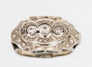 A diamond plaque ring. Set with single and old cut diamonds. 14ct white gold. Size M&frac12;. Weight 7.19 grams.