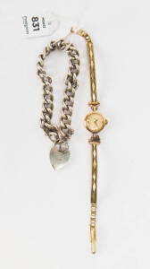 A lady's Omega wristwatch and a sterling silver curblink bracelet.&nbsp;