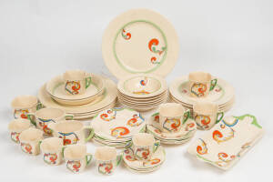 Royal Doulton "Syren" patterned art deco porcelain dinner ware with sandwich tray, coffee & tea ware (incomplete). 49 pieces.