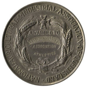 1909 Queensland Jubilee Medal, in silver (46mm), with "Queensland Jubilee 1859-1909"; and on reverse "National Agricultural & Industrial Association of Queensland. Awarded to" engraved "New South Wales Association Athletics". Ex William Alexander, manager
