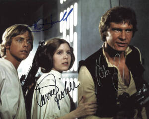 STAR WARS: AUTOGRAPHS: Collection of autographs from the original film series on photos and flyers including impressive movie still signed by Mark Hamill, Carrie Fisher and Harrison Ford; David Prowse and more