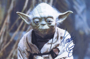 STAR WARS: AUTOGRAPHS: Collection of autographs from the original film series on photos and flyers, includes movie still shot signed Harrison Ford, Mark Hamill, Carrie Fisher and Peter Mayhew; Yoda screen shot signed Frank Oz; George lucas laminated and s