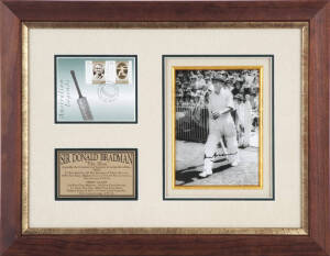 DON BRADMAN, display comprising signed photograph of Bradman walking out to bat, window mounted with part of FDC, framed & glazed, overall 49x38cm. With CoA.