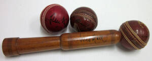 SIGNED CRICKET BALLS: Cricket ball attached to a bat knocker, signed by Gary Sobers & Wes Hall; cricket ball signed by Glenn McGrath & Brett Lee; cricket ball signed by Alan Davidson.