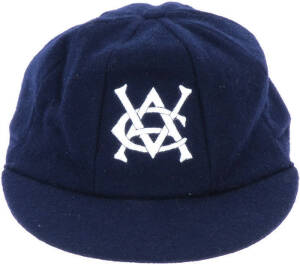 VICTORIA CRICKET CAP, baggy blue with embroidered "VCA" badge on front, made by Albion, owner unknown (possibly Ray Bright), in mint condition.