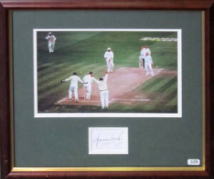 SHANE WARNE, display comprising signature on piece, window mounted with colour photograph of "Ball of the Century", framed & glazed, overall 46x43cm.