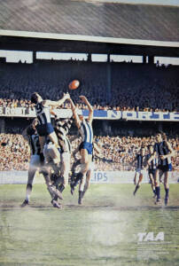 AIRLINE POSTERS: TAA poster showing 1976 Drawn Grand Final (63x99cm); Ansett poster showing 1977 VFL Grand Final (68x98cm). Fair/Good condition.