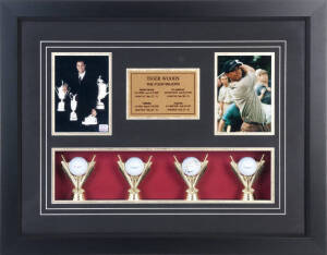 TIGER WOODS, display "Tiger Woods, The Four Majors" comprising signed golf ball, window mounted with two photographs & 3 other golf balls, framed & glazed, overall 72x56cm. With CoA.