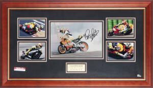 VALENTINO ROSSI: Display comprising signed photograph, window mounted with four other photographs, framed & glazed, overall 87x50cm. With CoA.