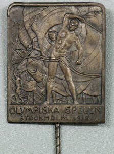 1912 Stockholm Stick Pin, rectangular, 22x27mm, with design similar to the Official Games poster, sometimes referred to as the flag bearer's pin. Ex William Alexander, manager of Australasia's (Australia & NZ combined) Athletics team.